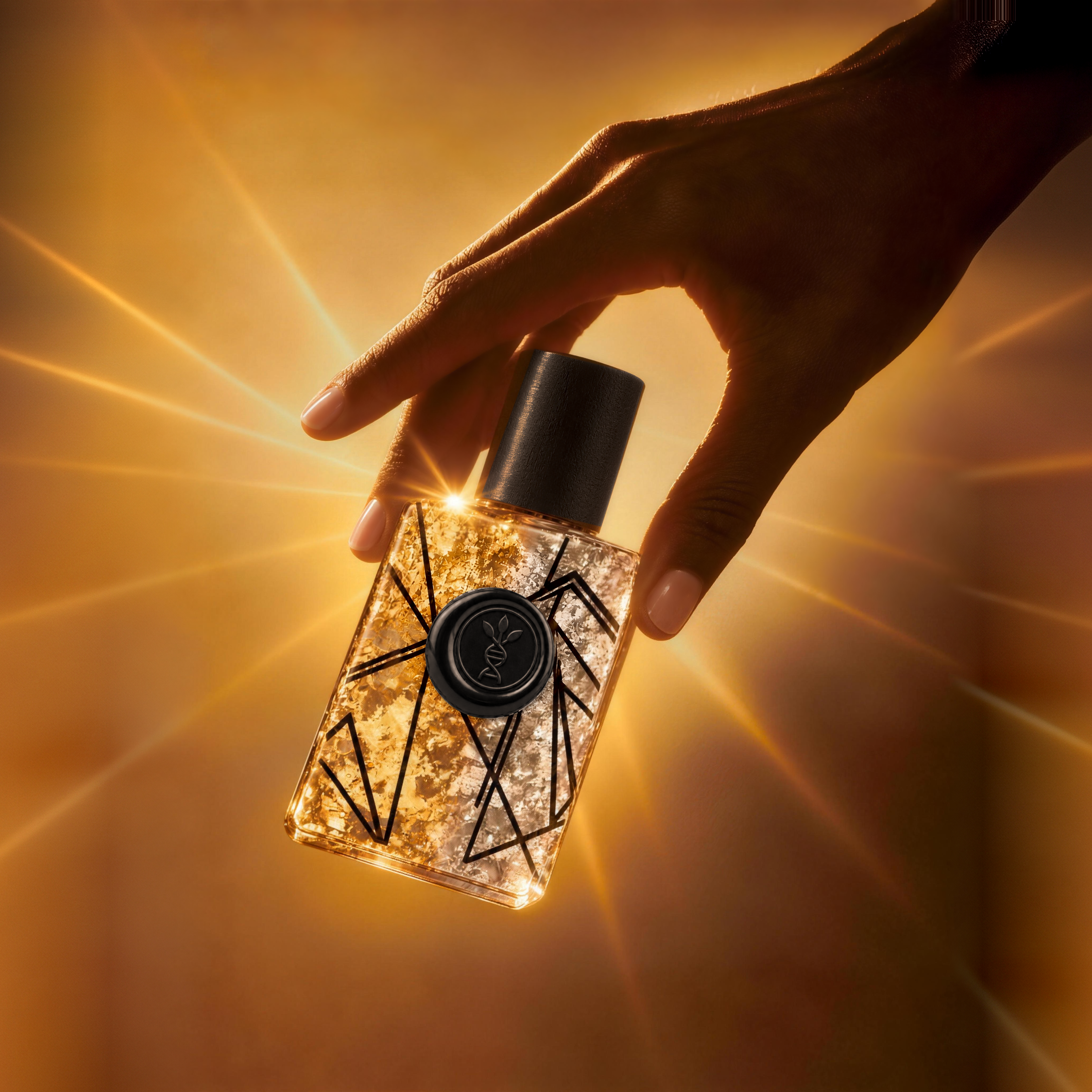 The Scent of Thought eau de parfum by AromaMeta — a hand holding the gold and silver leaf bottle at an angle in amber rays